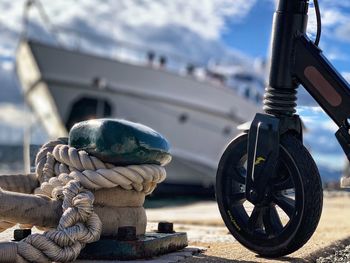 Close-up of rope tied to bollard