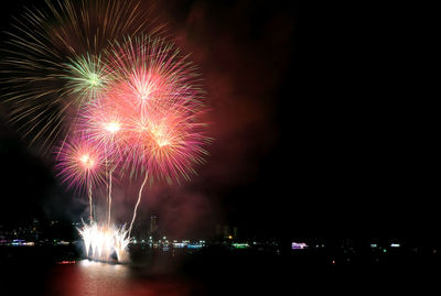 Amazing multi-color fireworks splashing in the night sky