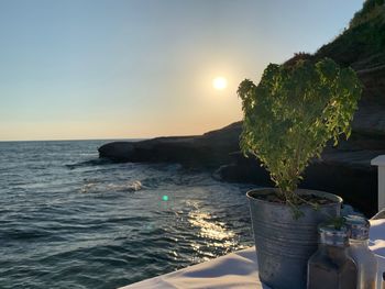 Scenic view of sea against sky during sunset