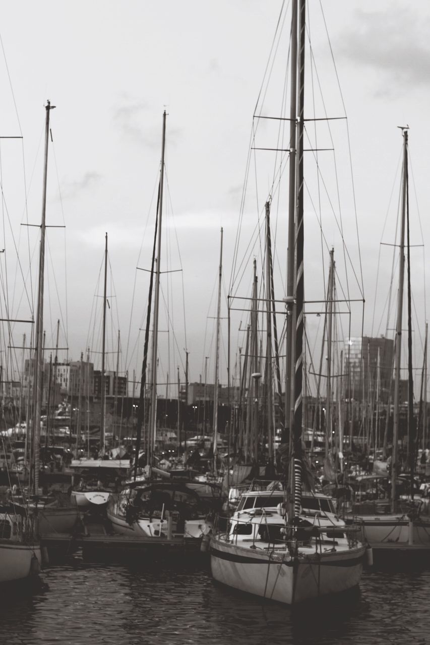 nautical vessel, mast, transportation, moored, mode of transport, boat, sailboat, harbor, sky, outdoors, day, cloud - sky, water, waterfront, no people, tranquility, nature, travel destinations, yacht, scenics, sailing, architecture, sailing ship