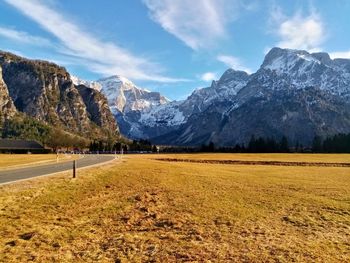 Scenic view of snowcapped mountains against sky