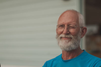 Close-up of senior man blinking eye