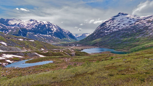 Scenic view of snowcapped mountains against sky