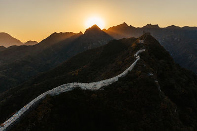 Scenic view of mountains against sky during sunset