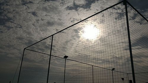 Low angle view of basketball hoop against sky