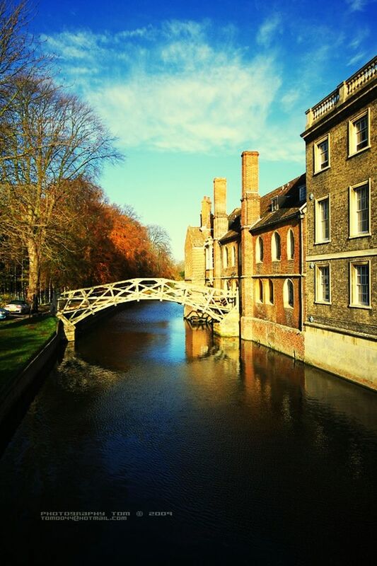 BRIDGE OVER RIVER BY CITY AGAINST SKY