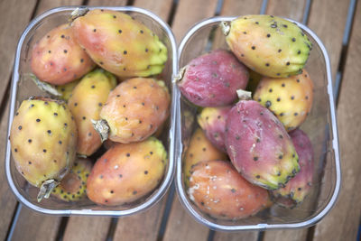 High angle view of fruits in basket on table