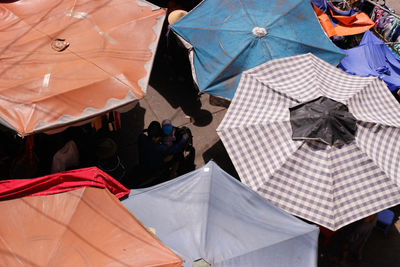 High angle view of umbrellas at market