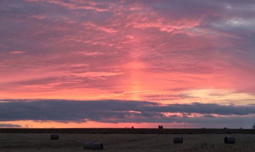 Scenic view of dramatic sky during sunset