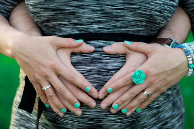 Cropped image of woman holding hands