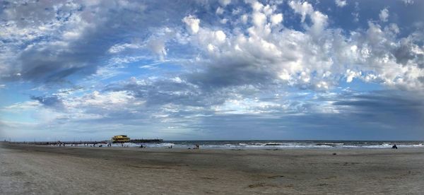 Scenic view of beach against sky