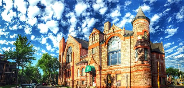 Low angle view of building against blue sky