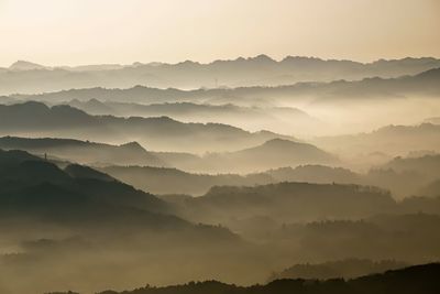 Scenic view of mountains against sky during sunset