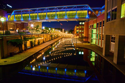 Illuminated buildings in city at night