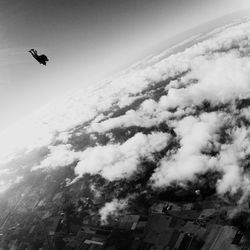 People paragliding in sky