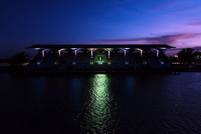 Reflection of illuminated buildings in water