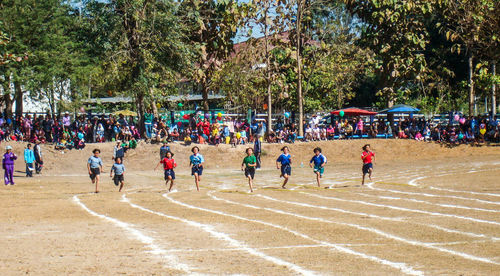 Group of people playing soccer