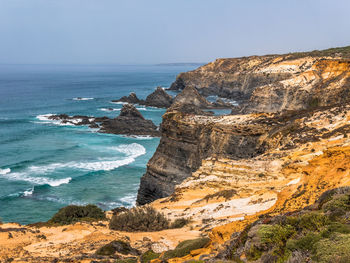 Scenic view of sea against clear sky