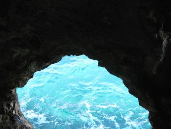 High angle view of rock formation in sea