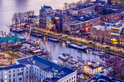 Aerial view of the ferry harbour marina during the blue hour after sunset