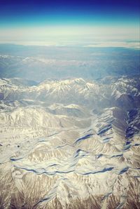 Aerial view of snow covered landscape