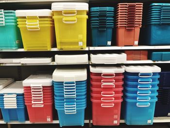 Full frame shot of colorful baskets arranged on shelf for sale in store