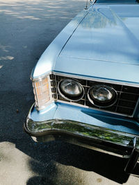 Close-up of car on street