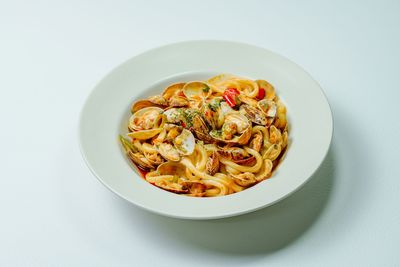 High angle view of food in plate on white background