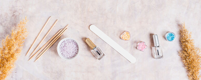 High angle view of beauty products on table