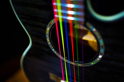 Close-up of illuminated lighting equipment on table