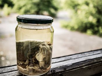 Close-up of glass jar on table