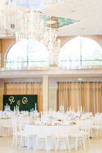 Empty chairs and tables in restaurant