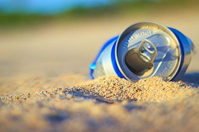 Close-up of vintage car on beach