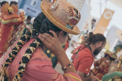 Close-up of woman wearing hat during carnival