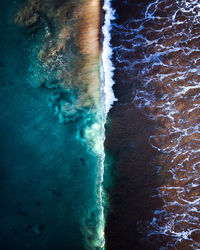 Sea waves splashing on shore