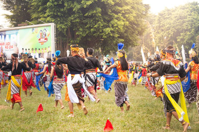 Colossal topeng dance performed by thousands of dancers in the wonosobo square