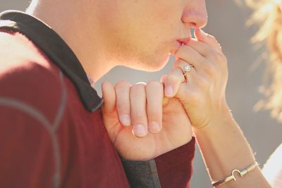 Close-up of hand holding hands