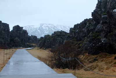 Scenic view of snowcapped mountains against sky