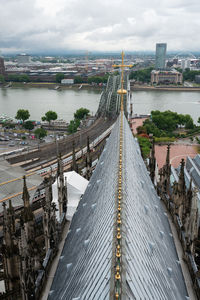 High angle view of cologne cathedral and hohenzollern bridge in city