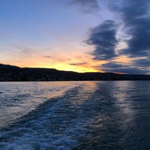 Scenic view of sea against sky at sunset