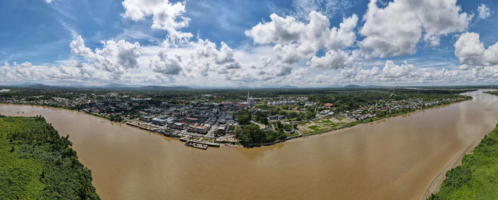 Panoramic view of city and buildings against sky