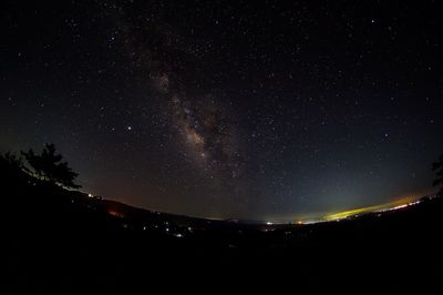 Low angle view of star field against sky at night