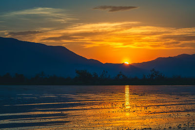Beautiful colorful sunrise over lake kerkini in serres in central macedonia in greece .