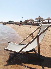 Scenic view of beach against clear sky