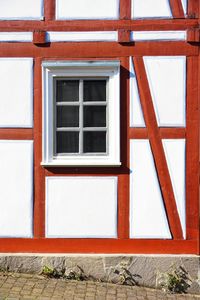 Closed window of white building