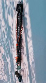 People skiing on snow covered mountain against sky