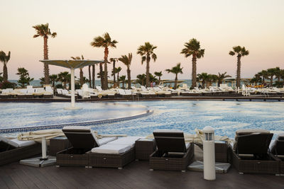 Chairs and swimming pool at resort