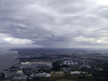 High angle view of buildings in city against sky