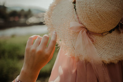 Rear view of woman wearing hat