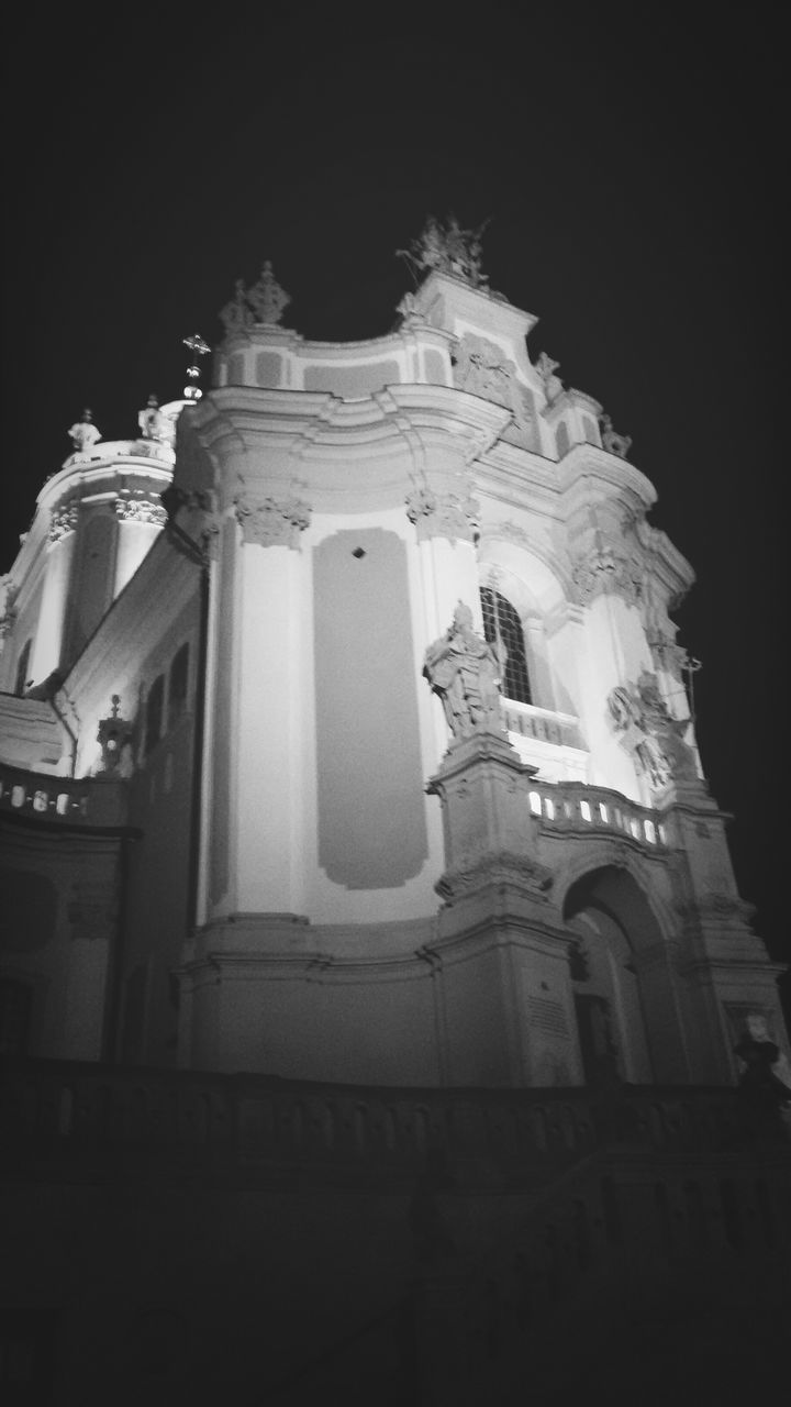 architecture, building exterior, built structure, low angle view, night, religion, place of worship, church, spirituality, illuminated, clear sky, facade, sky, cathedral, history, no people, outdoors, building